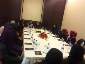 Mrs. Narges Nehan representing the Afghan women's organization "Equality for Peace and Democracy (EPD)" discusses with participants of the workshop.