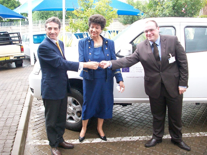 The Head of the elegation of the European Union, H.E. Raul Fuentes-Milani, hands the project vehicle over to Veronica de Klerk, Executive Director of, WAD and Holger Haibach, KAS Representrative for Namibia and Angola