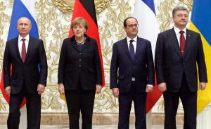 Wladimir Putin, Angela Merkel, François Hollande und Petro Poroschenko in Minsk, Weißrussland (v.l.n.r.) | Foto: dpa