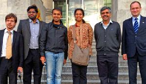 The delegation in front of the German Bundestag with Dr. Lars Peter Schmidt (right)