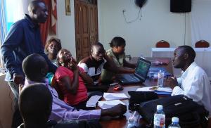 journalists editing their reportage about street kids in Mbale