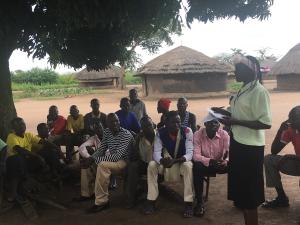 Innocent Aloyo and participants of the Kabake show in Paomo Lawange-Kwar, a village near Gulu city