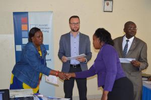 After successfully attending the training, participants receive certificates of attendance