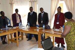 ACFODE Executive Director Regina Bafaki (r.) interacting with Councillors from Kiboga District