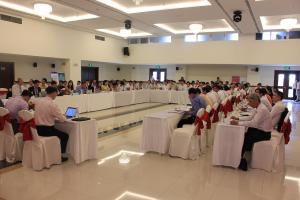 The conference room is filled with experts and local policy makers