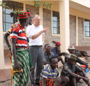 Head of KAS office Kenya, Dr. Jan Cernicky having a discussion with a group of participants after the seminar.