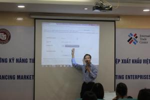 Mr. Dao Ngoc Tien explains his presentation