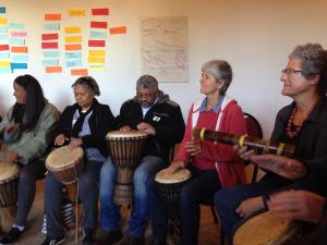 Playing the drums together.