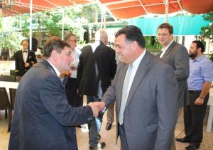 Erwin Schneider, district administrator of Altötting, greeting Lebanese MP Joseph Maalouf