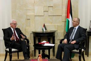 The Chairman (left) during his meeting with Dr. Rami Hamdallah, Prime Minister of the State of Palestine, in Ramallah.