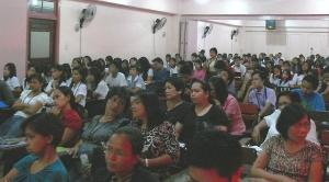 Students and faculty at the Arellano University listening Centrist Democratic ideology