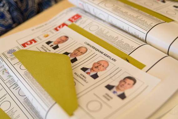 Istanbul, Turkey: A voting card seen displayed on a table with faces of the candidates.