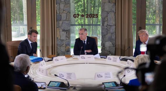 From left: French President Emmanuel Macron, Canadian Prime Minister Mark Carney, and U.S. President Donald Trump, take part in a working session at the G7 Summit in Kananaskis, Alberta, Canada, on Monday, June 16, 2025.