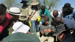 Dr. Mark Graham, GroundTruth, explains the participant the importance of the diverse creatures for the aquatic system.