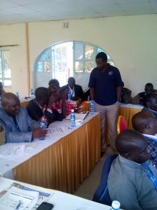 Mr.Olwamba -one of the trainers-probing some of the participants on the concepts being learnt during the 5 days workshop